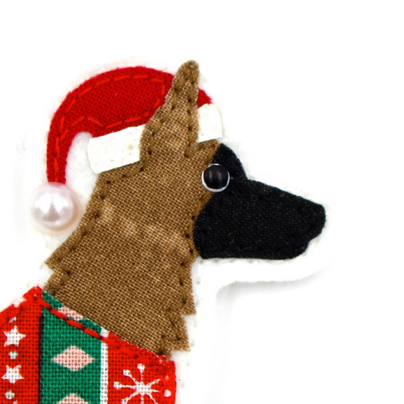 Close up of the face of a handmade Belgian Malinois dog decoration, perfect gift for pet lovers