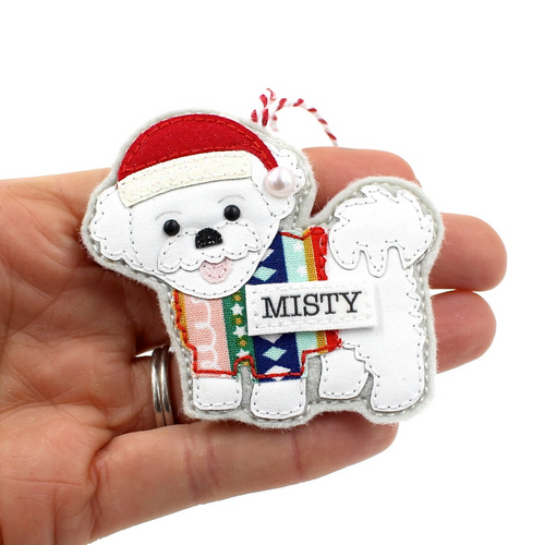 Personalised handmade cotton and felt Bichon Frise decoration with name, held in hand for size reference, perfect gift for pet lovers